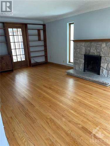 97 Marlowe Crescent, Ottawa, ON - Indoor Photo Showing Living Room With Fireplace