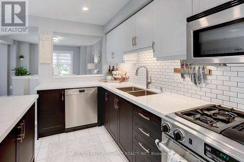 25C - 928 Queen Street W, Mississauga (Lorne Park), ON - Indoor Photo Showing Kitchen With Double Sink With Upgraded Kitchen