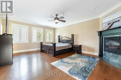 15 Turtle Lake Drive, Halton Hills, ON - Indoor Photo Showing Bedroom With Fireplace