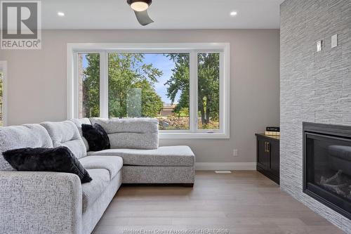 113 Bear Street, Essex, ON - Indoor Photo Showing Living Room With Fireplace