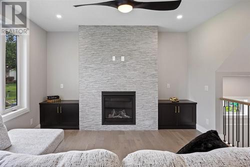 113 Bear Street, Essex, ON - Indoor Photo Showing Living Room With Fireplace