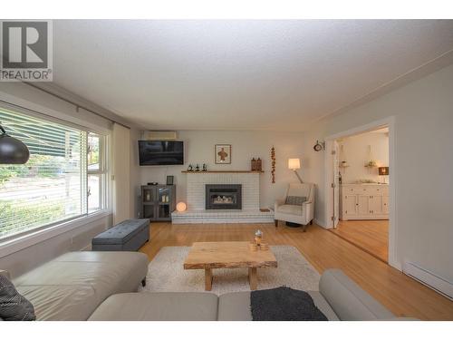 2506 24 Street, Vernon, BC - Indoor Photo Showing Living Room With Fireplace