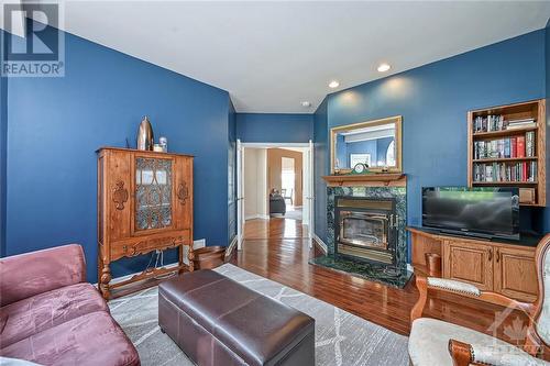 2158 Old Prescott Road, Greely, ON - Indoor Photo Showing Living Room With Fireplace