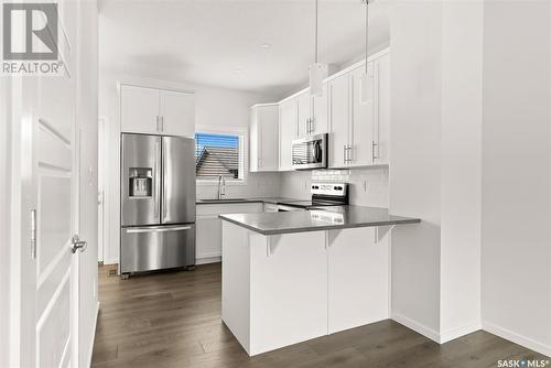 7668 Mapleford Boulevard, Regina, SK - Indoor Photo Showing Kitchen With Stainless Steel Kitchen