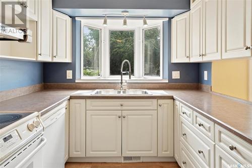 22 Dragan Crescent, Saskatoon, SK - Indoor Photo Showing Kitchen With Double Sink