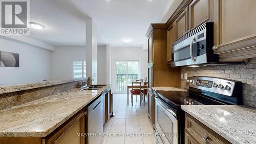 26 - 230 Paisley Boulevard W, Mississauga (Cooksville), ON - Indoor Photo Showing Kitchen With Double Sink With Upgraded Kitchen