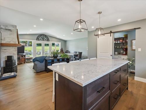 2526 Silver King Road, Nelson, BC - Indoor Photo Showing Kitchen With Fireplace