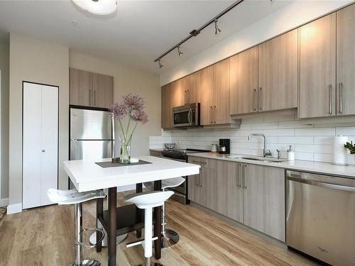 317-595 Pandora Ave, Victoria, BC - Indoor Photo Showing Kitchen With Stainless Steel Kitchen