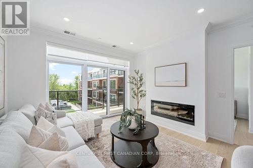 317 - 1975 Fountain Grass Drive, London, ON - Indoor Photo Showing Living Room With Fireplace