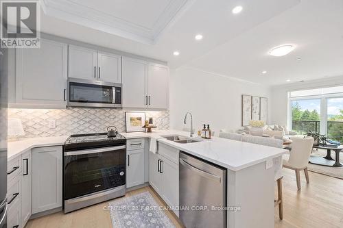 317 - 1975 Fountain Grass Drive, London, ON - Indoor Photo Showing Kitchen With Double Sink With Upgraded Kitchen