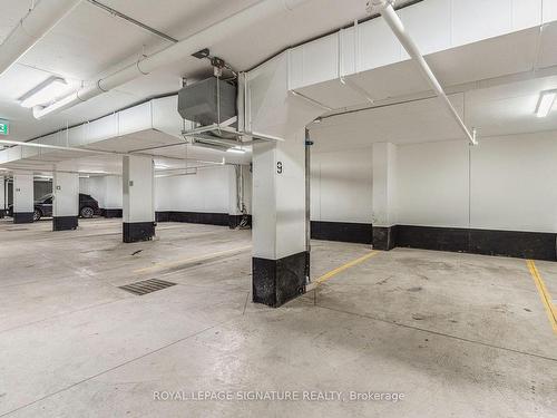 403-150 Logan Ave, Toronto, ON - Indoor Photo Showing Garage