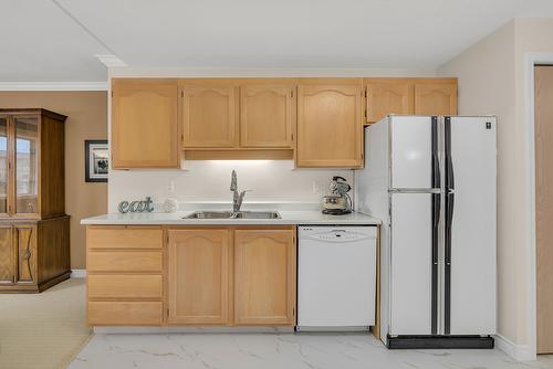 100-2477 Ingram Road, West Kelowna, BC - Indoor Photo Showing Kitchen With Double Sink