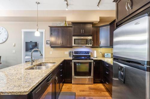 106-3735 Casorso Road, Kelowna, BC - Indoor Photo Showing Kitchen With Double Sink With Upgraded Kitchen