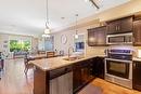 106-3735 Casorso Road, Kelowna, BC  - Indoor Photo Showing Kitchen With Double Sink 