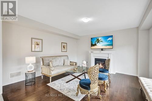 15 Douglas Kemp Crescent, Clarington (Bowmanville), ON - Indoor Photo Showing Living Room With Fireplace