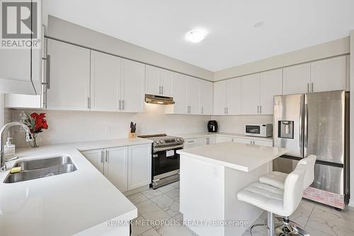 15 Douglas Kemp Crescent, Clarington (Bowmanville), ON - Indoor Photo Showing Kitchen With Stainless Steel Kitchen With Double Sink With Upgraded Kitchen