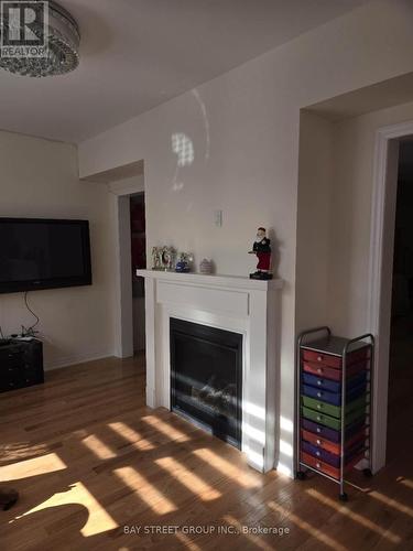 61 Greenspire Avenue, Markham (Wismer), ON - Indoor Photo Showing Living Room With Fireplace