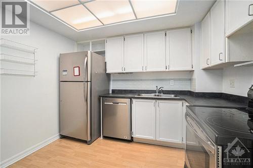 500 Laurier Avenue Unit#903, Ottawa, ON - Indoor Photo Showing Kitchen With Double Sink