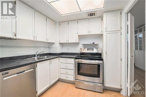 500 Laurier Avenue Unit#903, Ottawa, ON - Indoor Photo Showing Kitchen With Double Sink