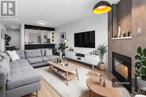 707 1199 Eastwood Street, Coquitlam, BC - Indoor Photo Showing Living Room With Fireplace