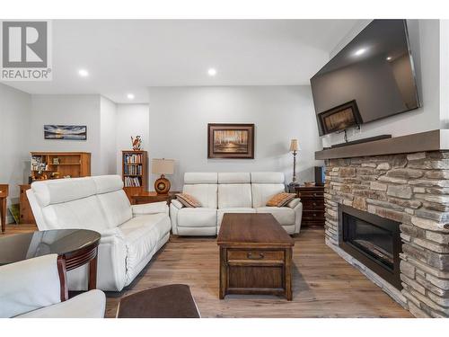 2715 Golf Course Drive Unit# 26, Blind Bay, BC - Indoor Photo Showing Living Room With Fireplace