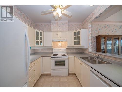 877 K.L.O Road Unit# 307, Kelowna, BC - Indoor Photo Showing Kitchen With Double Sink