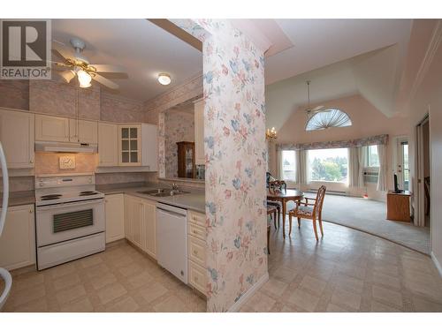 877 K.L.O Road Unit# 307, Kelowna, BC - Indoor Photo Showing Kitchen With Double Sink