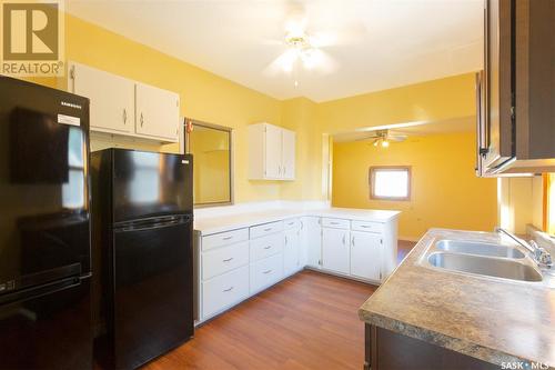 1109 9Th Avenue Nw, Moose Jaw, SK - Indoor Photo Showing Kitchen With Double Sink