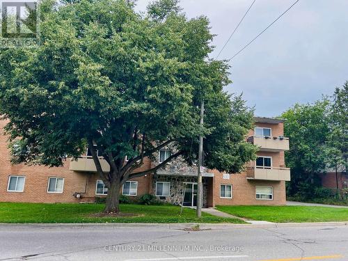 102 - 61 Townline, Orangeville, ON - Outdoor With Facade