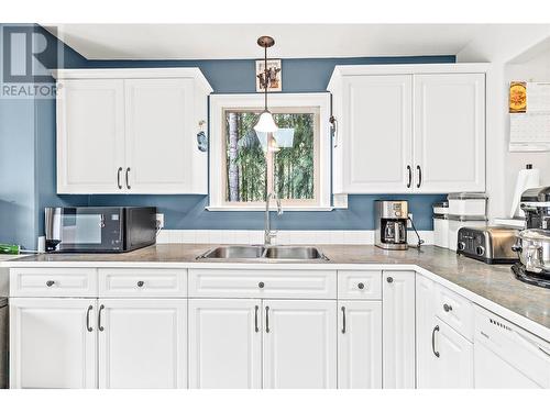 1144 Wharf Road, Scotch Creek, BC - Indoor Photo Showing Kitchen With Double Sink