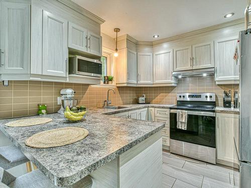 Cuisine - 155  - 155A Rue Champagne, Sainte-Sophie, QC - Indoor Photo Showing Kitchen With Upgraded Kitchen