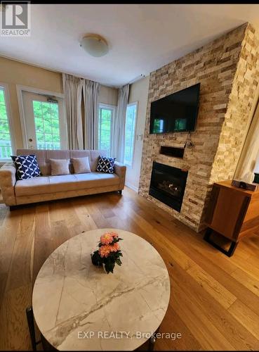 2264 - 90 Highland Drive, Oro-Medonte (Shanty Bay), ON - Indoor Photo Showing Living Room With Fireplace