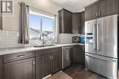 419 Secord Way, Saskatoon, SK - Indoor Photo Showing Kitchen With Double Sink