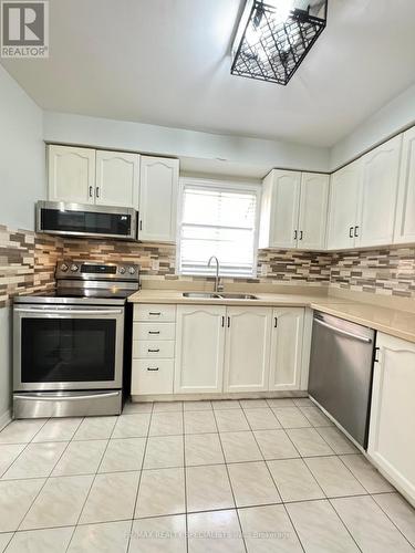 Unit #1 - 659 Roselaire Trail, Mississauga (Hurontario), ON - Indoor Photo Showing Kitchen With Stainless Steel Kitchen With Double Sink