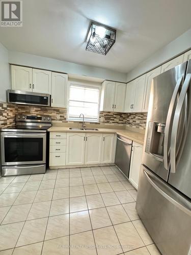 Unit #1 - 659 Roselaire Trail, Mississauga (Hurontario), ON - Indoor Photo Showing Kitchen With Stainless Steel Kitchen With Double Sink