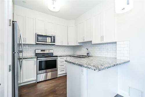 101 Locke Street S|Unit #516, Hamilton, ON - Indoor Photo Showing Kitchen With Upgraded Kitchen