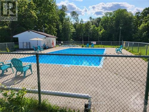 249 Teal Crescent, Ottawa, ON - Outdoor With In Ground Pool With Backyard