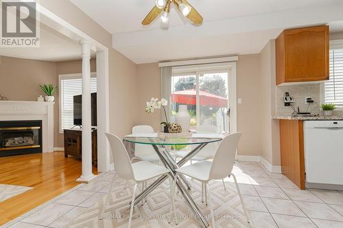 7 Teversham Court, Markham (Rouge Fairways), ON - Indoor Photo Showing Dining Room With Fireplace