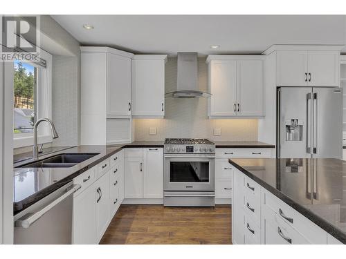 360 Rio Drive S, Kelowna, BC - Indoor Photo Showing Kitchen With Double Sink With Upgraded Kitchen