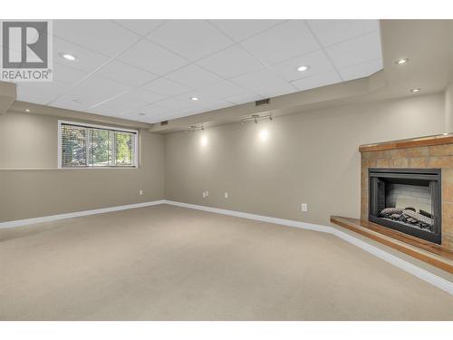 360 Rio Drive S, Kelowna, BC - Indoor With Fireplace