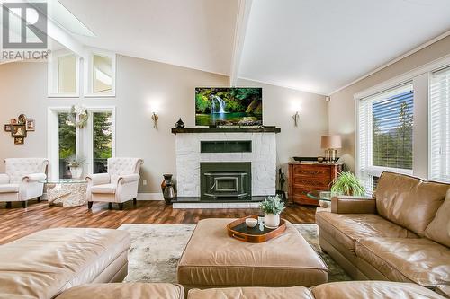 16151 Barkley Road, Lake Country, BC - Indoor Photo Showing Living Room With Fireplace