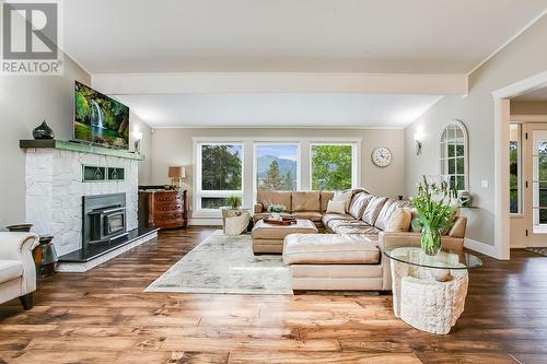 16151 Barkley Road, Lake Country, BC - Indoor Photo Showing Living Room With Fireplace