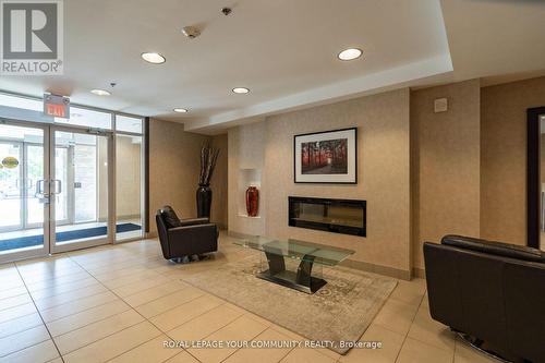 Ph-402 - 5317 Upper Middle Road, Burlington (Orchard), ON - Indoor Photo Showing Other Room With Fireplace