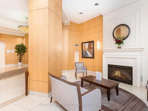 1408-8 Mckee Ave, Toronto, ON - Indoor Photo Showing Living Room With Fireplace