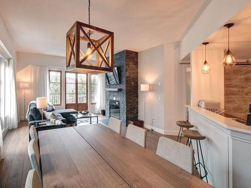 Dining room - 201-3035 Ch. De La Chapelle, Mont-Tremblant, QC - Indoor With Fireplace