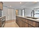 Cuisine - 415-360 Rue Atateken, Montréal (Ville-Marie), QC  - Indoor Photo Showing Kitchen With Double Sink 