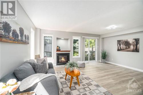 53 San Remo Private, Ottawa, ON - Indoor Photo Showing Living Room With Fireplace