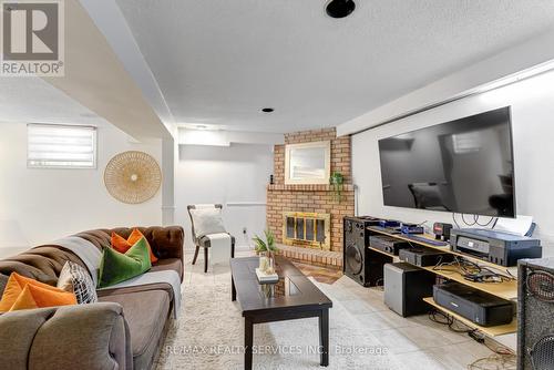 32 Saturn Drive, Brampton (Madoc), ON - Indoor Photo Showing Living Room With Fireplace