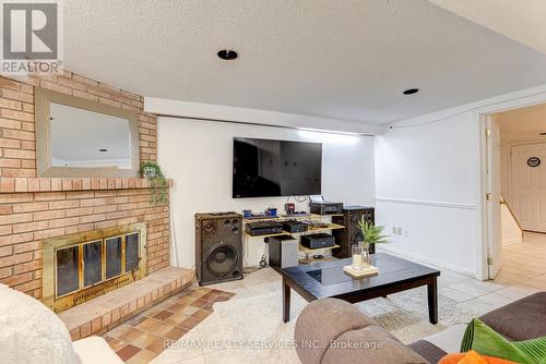 32 Saturn Drive, Brampton (Madoc), ON - Indoor Photo Showing Living Room With Fireplace