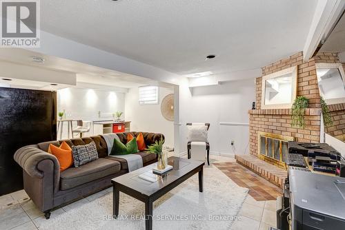 32 Saturn Drive, Brampton (Madoc), ON - Indoor Photo Showing Living Room With Fireplace